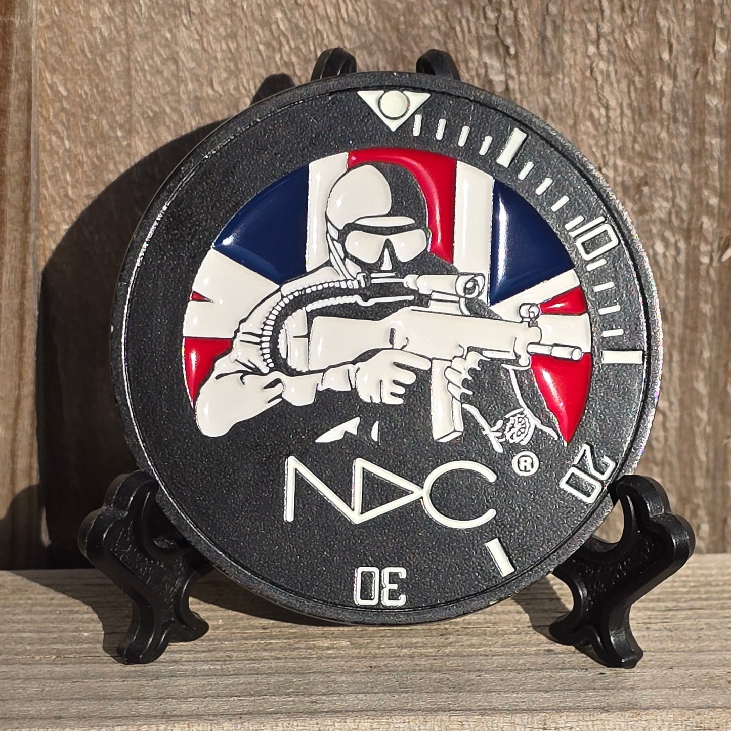 NDC challenge coin featuring glow-in-the-dark - Limited Edition - NDC Straps
