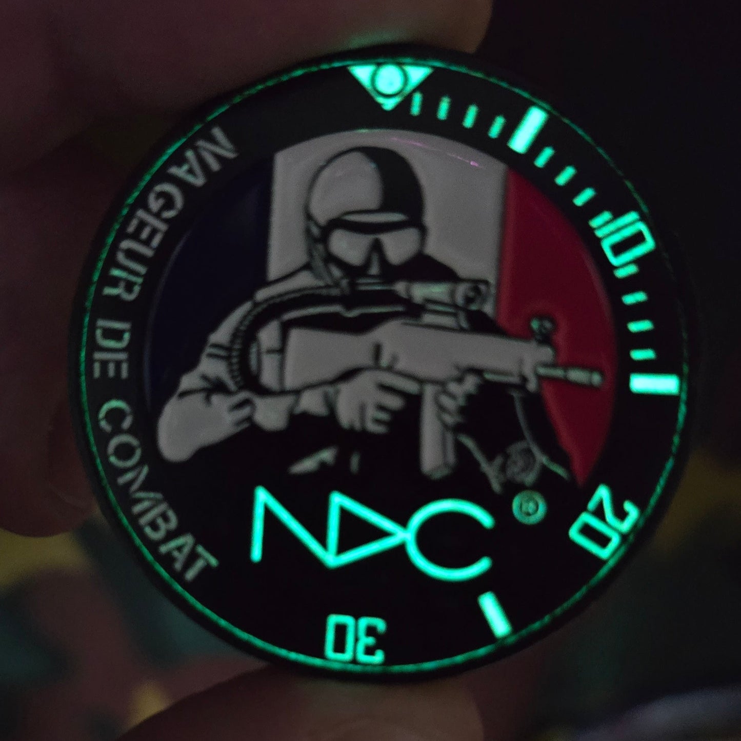 NDC challenge coin featuring glow-in-the-dark - Limited Edition - NDC Straps