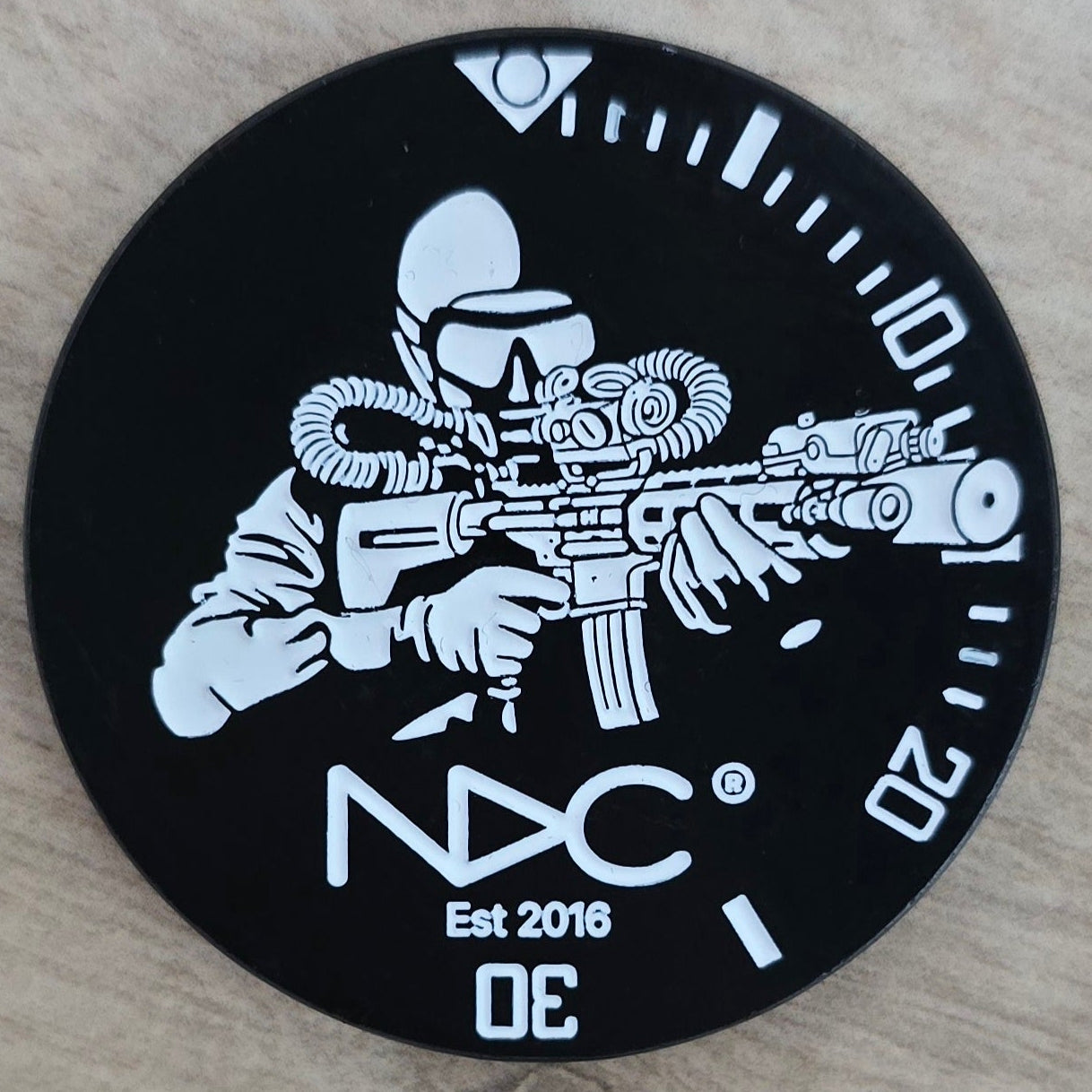 NDC challenge coin featuring glow-in-the-dark - Individually Numbered Limited Edition of 50 - NDC Straps